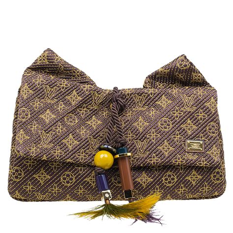 louis vuitton african queen clutch|Louis Vuitton African Queen Clutch .